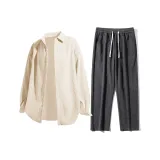 Абрикосовый топ + темно-серые штаны