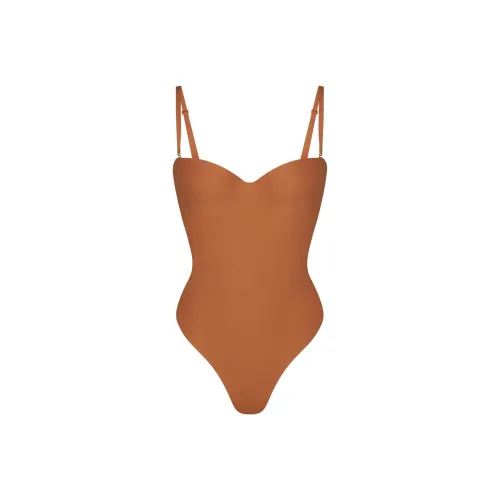 SKIMS Комбинезон BODYSUIT с чашками и бретелями женский цвет бронза бронза