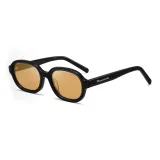 Черная оправа с прозрачным дизайном и линзами цвета чайного.