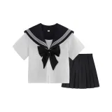 Черный воротник-стойка, короткая рукавная рубашка + черная короткая юбка + черный бант.