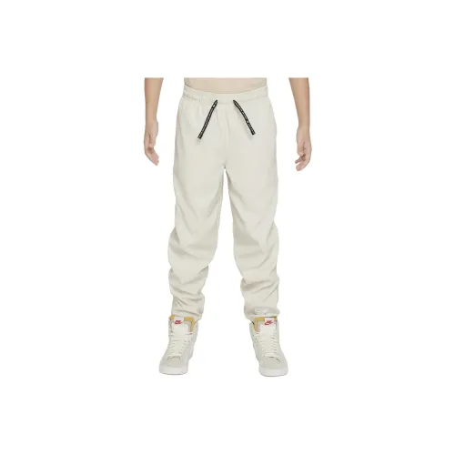 NIKE Коричневые Kids Брюки