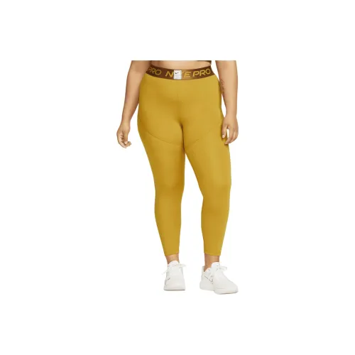 Nike Спортивные брюки Женские Желтые