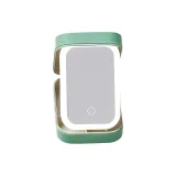 Зеленый принтер, ленты, свет, макияж, зеркальце