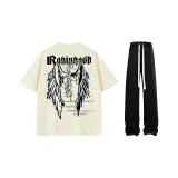 Абрикосовая футболка + черные повседневные штаны