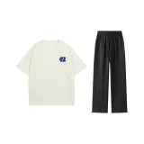 Абрикосовый топ+черные брюки