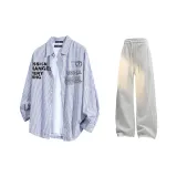 Синие и белые полоски + белые и серые штаны Фотиния