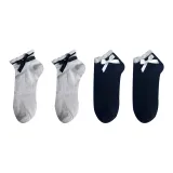 4 пачки (2 черных с белым бантом + 2 белых с полосами)