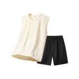 Комплект (абрикосовый топ+черные брюки)