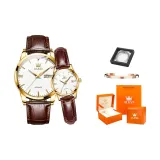 Коричневая кожа, золотое покрытие корпуса и белый циферблат.