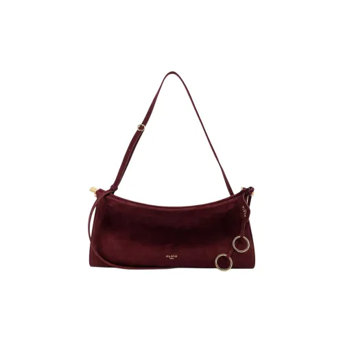 Alaia Сумка через плечо из замши сумка на плечо средняя женская бордового цвета
