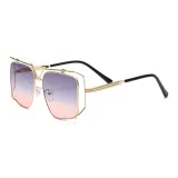 Золотая оправа с розово-серыми линзами