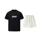 Чёрный топ + абрикосовые шорты