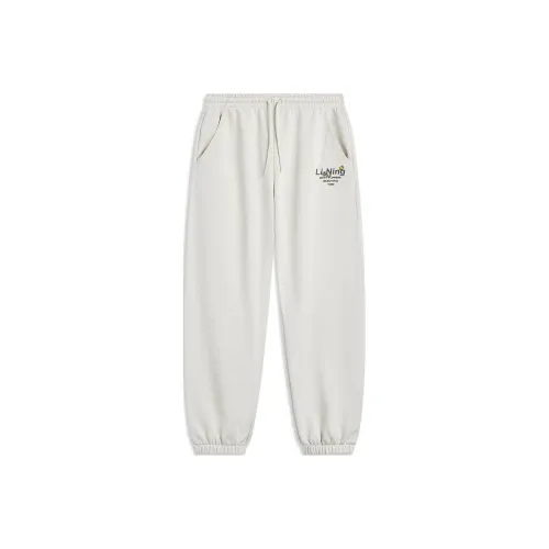 LINING Sports Life Collection Вязаные тренировочные штаны женские цветочная почка желто-серый