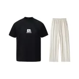 Чёрный топ + абрикосовые штаны