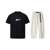 Чёрный топ + абрикосовые штаны