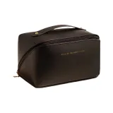 Сумка-подушка черного цвета с логотипом