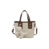 Белый с белым украшение в виде щенка