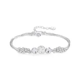 Женский браслет с подвесками в виде бусов