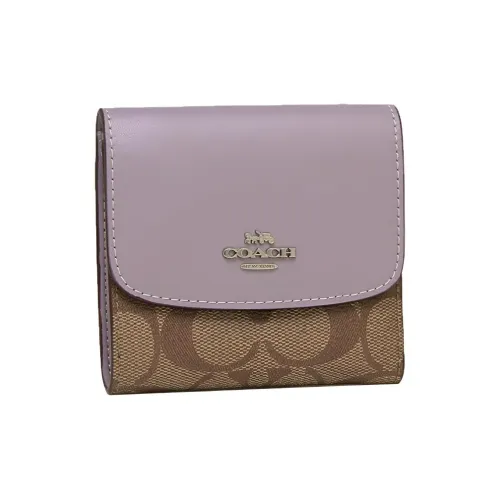 COACH Кошельки Женские