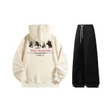 Комплект (абрикосовый топ+черные брюки)