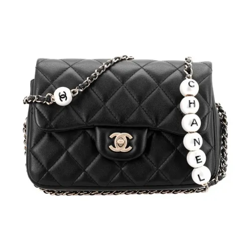 CHANEL Сумки через плечо Женские