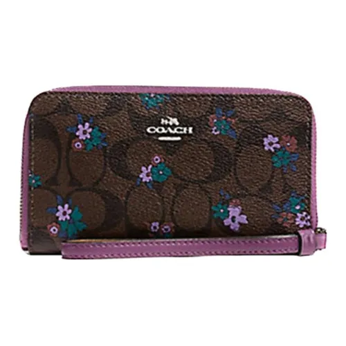 COACH Кошельки Женские