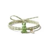 Зеленая резинка для волос с кроликом