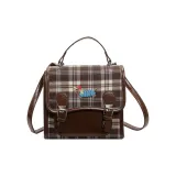 Коричневый с синими полосами.