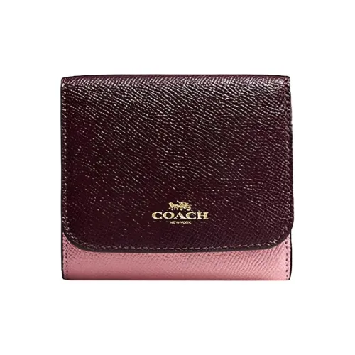 COACH Кошельки Женские