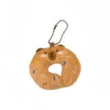 Коричневый пончик с изображением поросенка