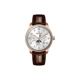 Элегантный золотой корпус, серебристый циферблат