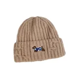 Бежевый вязаный щенок шапка