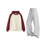 Абрикосовый топ с рукавами и бордовые штаны серого цвета