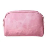 Розовая полукруглая сумка для макияжа