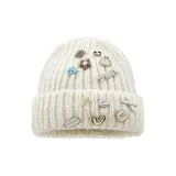 Аксессуары Вязаная шапка Молочный белый