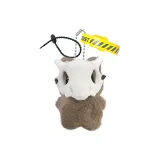 Коричневая кукла с большими глазами в виде кошки с маской в виде кости динозавра, черным шнуром и желтым ремешком