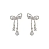 Серьги с бантом из серебра с цирконом (утолщенная настоящая золотая гальванизация)