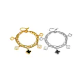 Двухслойный браслет с четырехлистным клевером (золото + серебро)