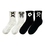 Чёрный цветок + чёрный двойной узел + белый двойной узел + белый бант