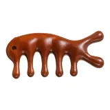 Портативный гребень Meridian Comb-Hole с отверстием в форме дельфина