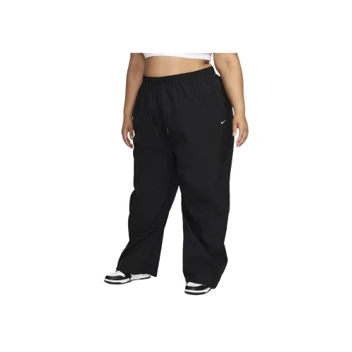Nike WINDRUNNER Повседневные брюки Женские Черный