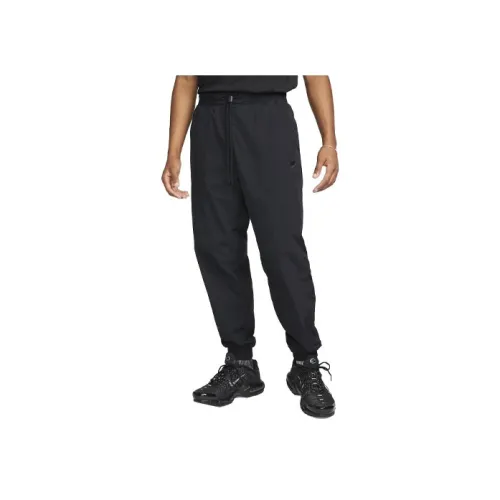 nike SPORTSWEAR TECH PACK Повседневные брюки Мужской Черный