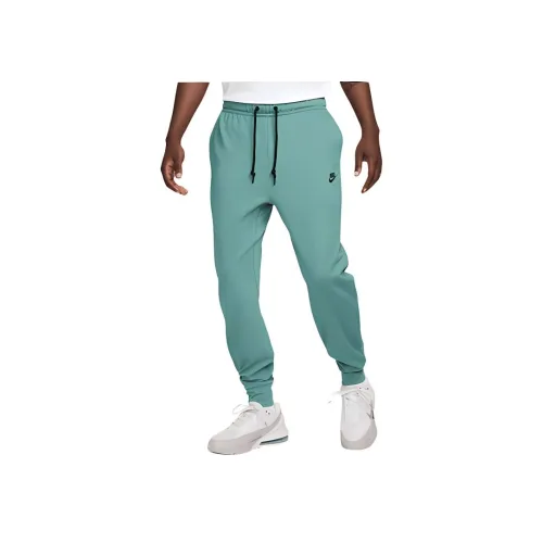 Nike SPORTSWEAR TECH PACK Вязаные тренировочные брюки мужские зеленые