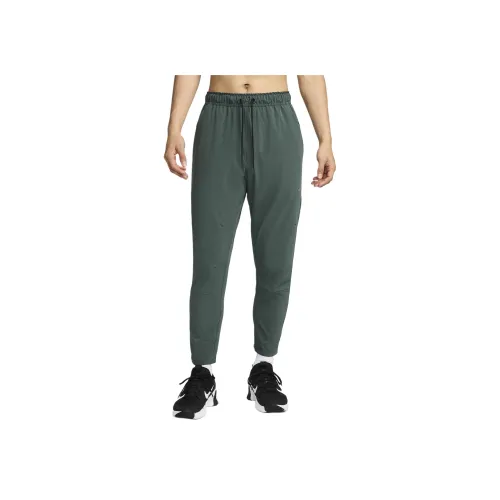 nike Unlimited Повседневные брюки Мужской Винтажный зеленый